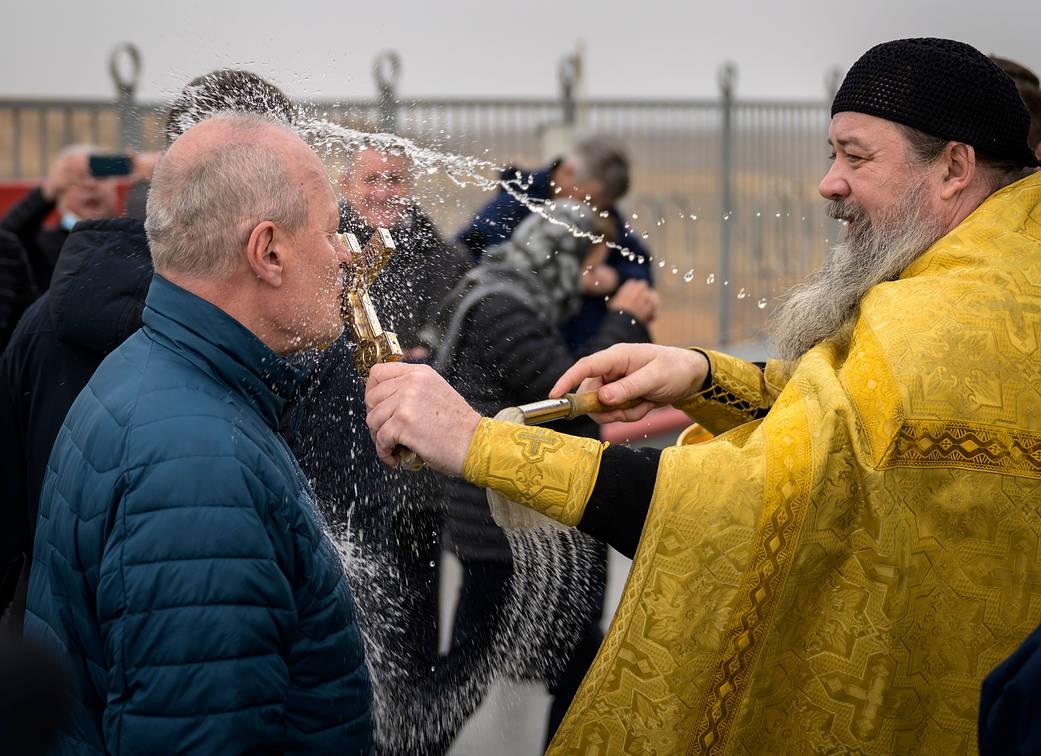 Russian Orthodox Priest blesses mission support personnel