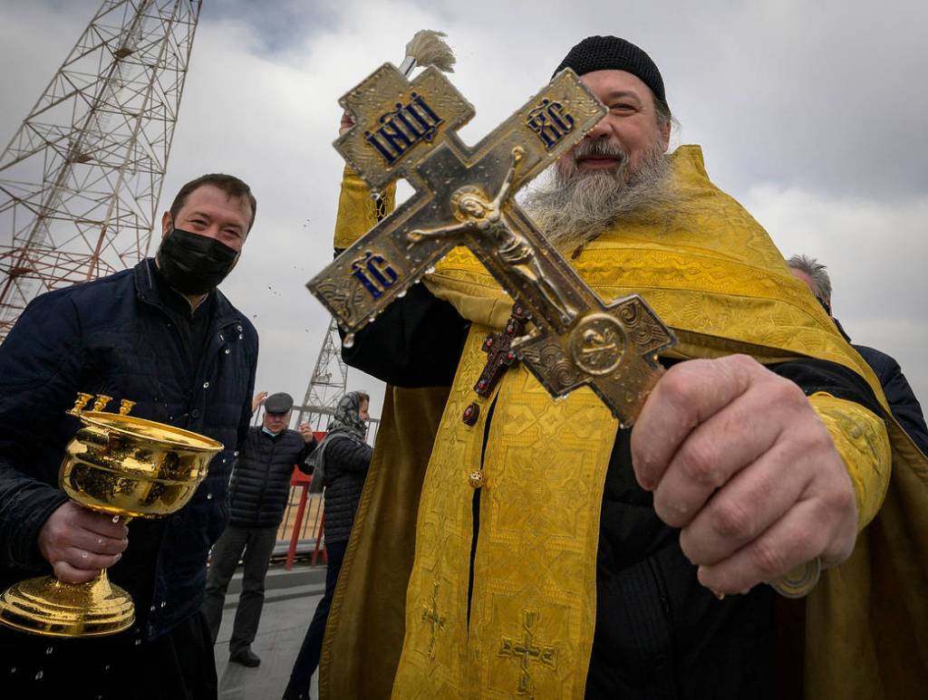 Russian Orthodox Priest blesses mission support personnel