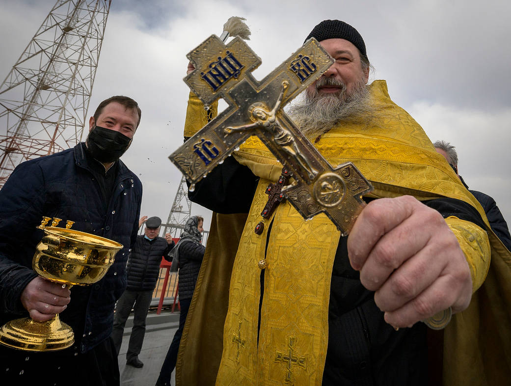 Russian Orthodox Priest blesses mission support personnel