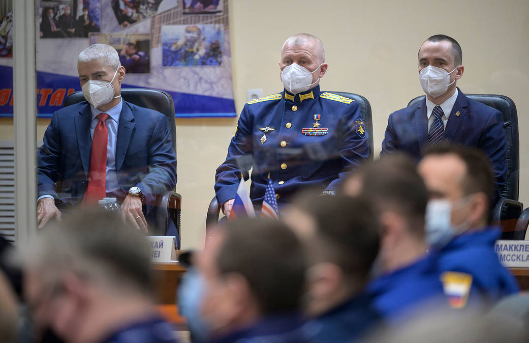 Expedition 65 crew during the State Commission meeting