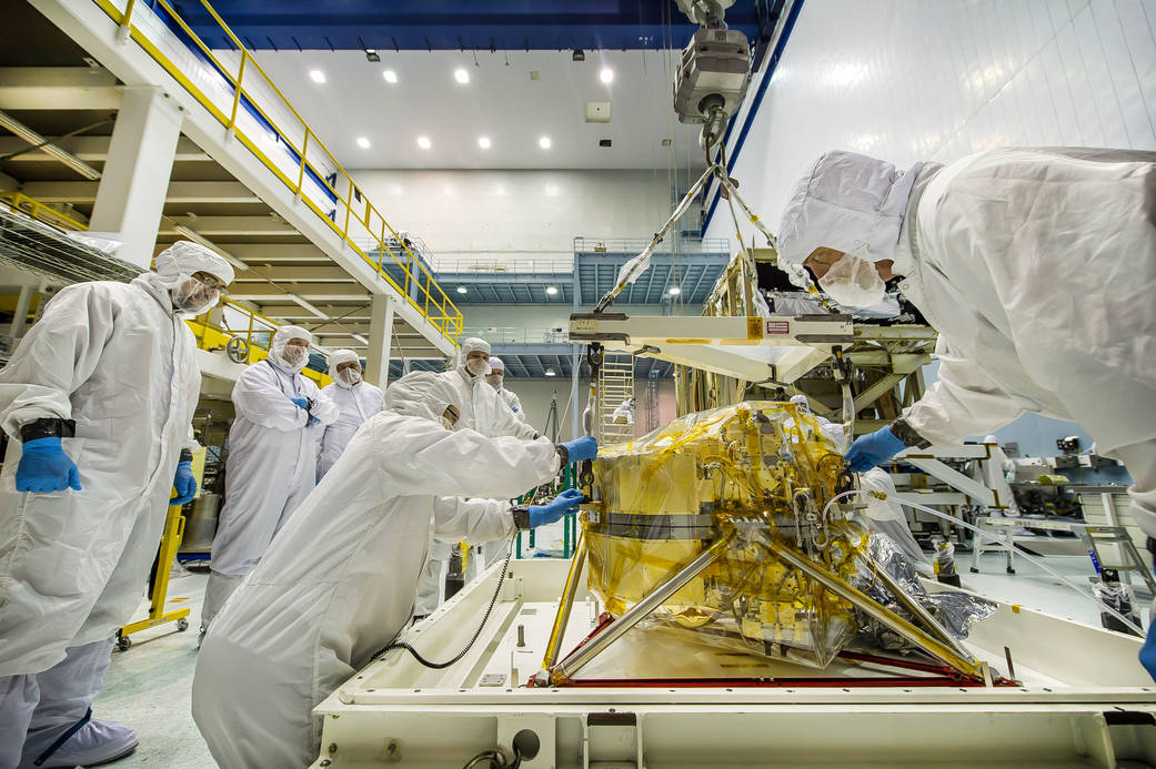 technicians work with NIRCam