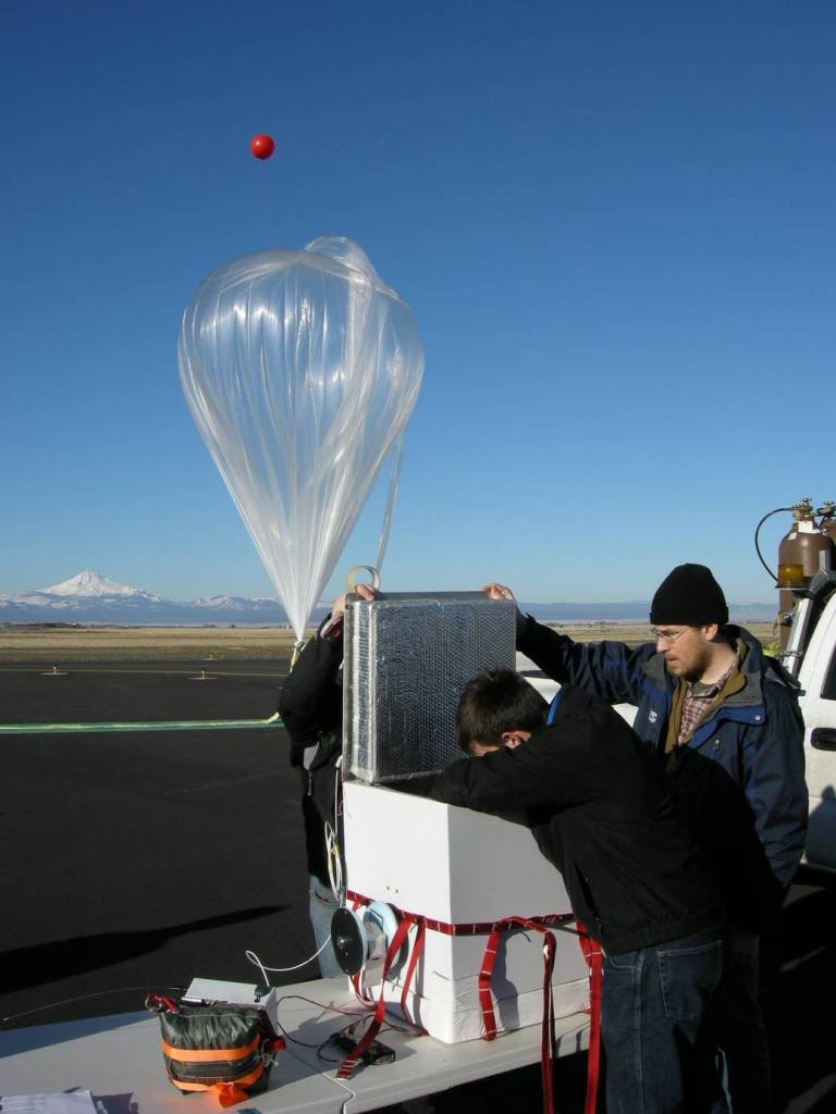 Technicians Check Payload for High-Altitude Balloon