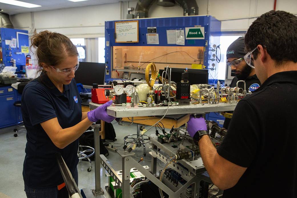 NASA's Orbital Syngas Commodity Augmentation Reactor (OSCAR) is assembled in the Space Station Processing Facility.