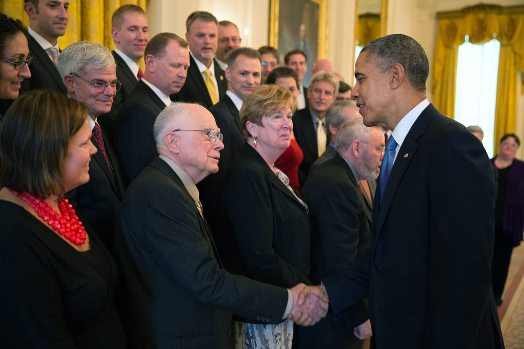 President Barack Obama congratulates William Borucki 