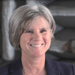 Peggy Cornell smiles during interview at NASA Glenn Research Center.