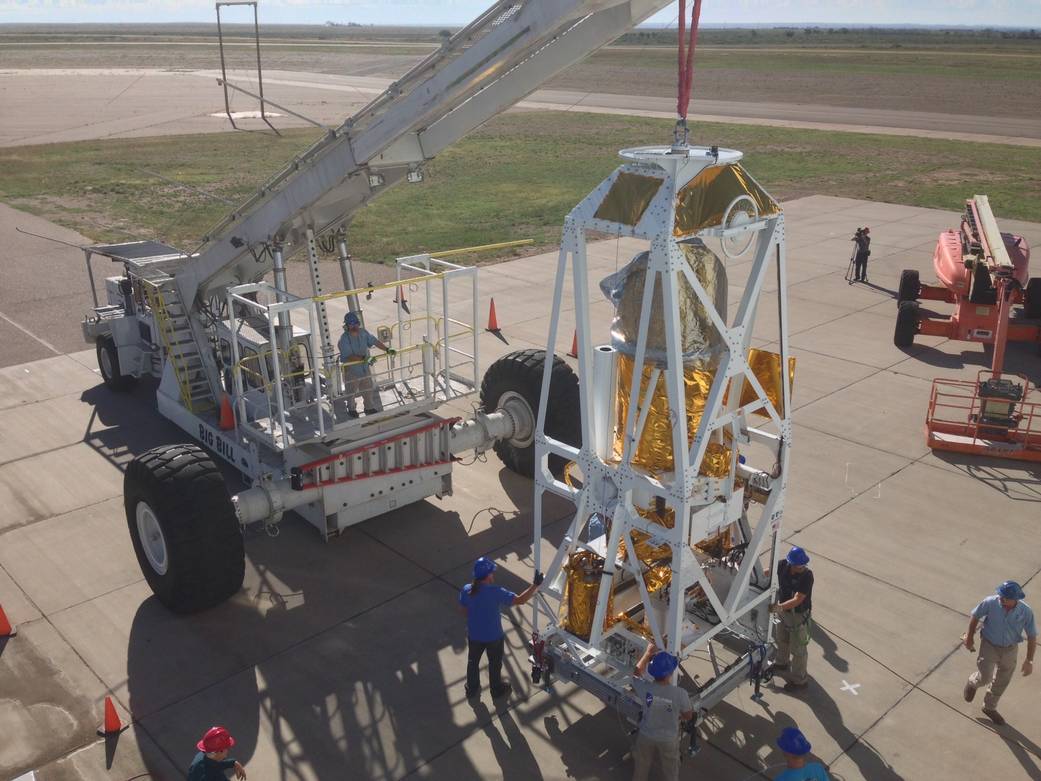 The Balloon Rapid Response for ISON (BRRISON) payload is rolled out of its processing bay this morning at Ft. Sumner, N.M., for 