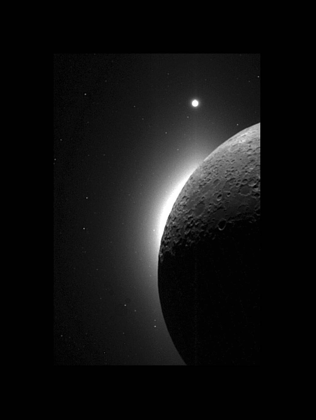 Black and white image of the moon close up with Venus in distance