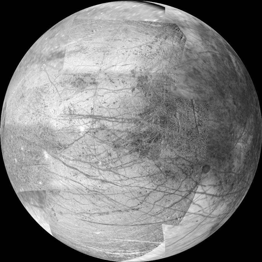 Closeup black and white mosaic image of moon Europa