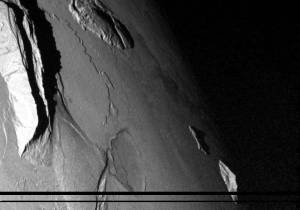 Mountains in shadow on Jupiter's moon Io