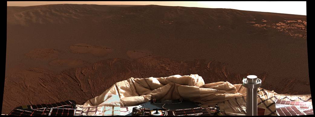 Panorama of side of Mars crater with rover visible at bottom of frame