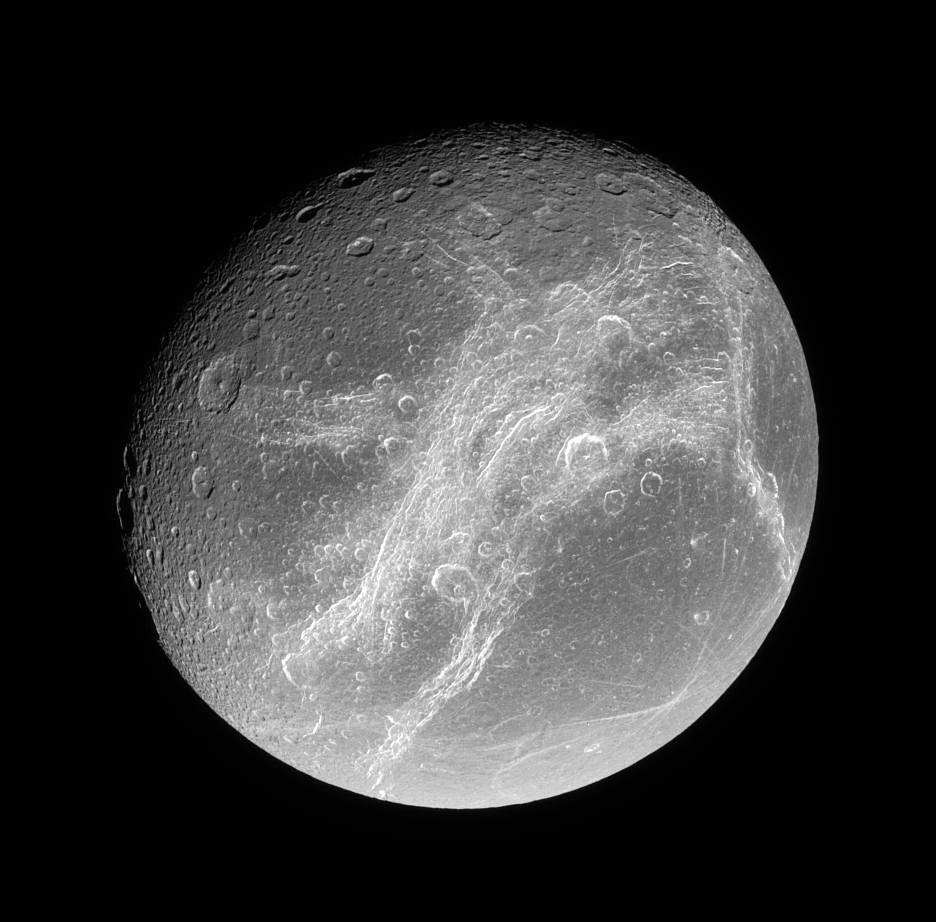 Dione moon closeup showing cliffs