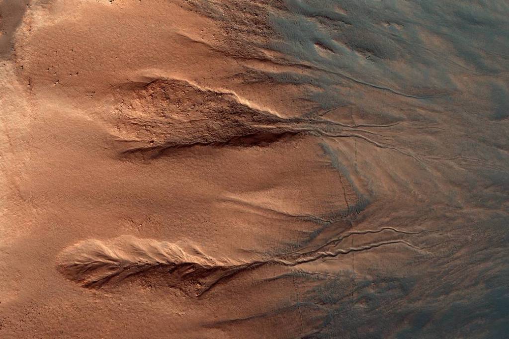 Contrasting Colors of Crater Dunes and Gullies