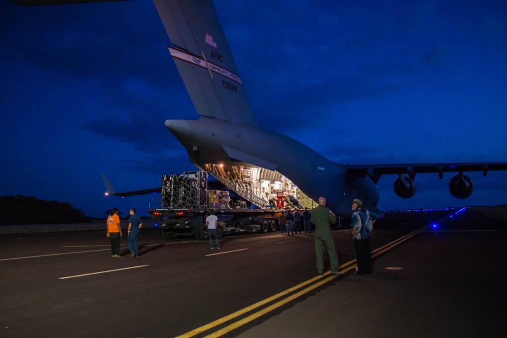 Engineers unload ground support equipment for a June engineering test flight above Kauai, Hawaii