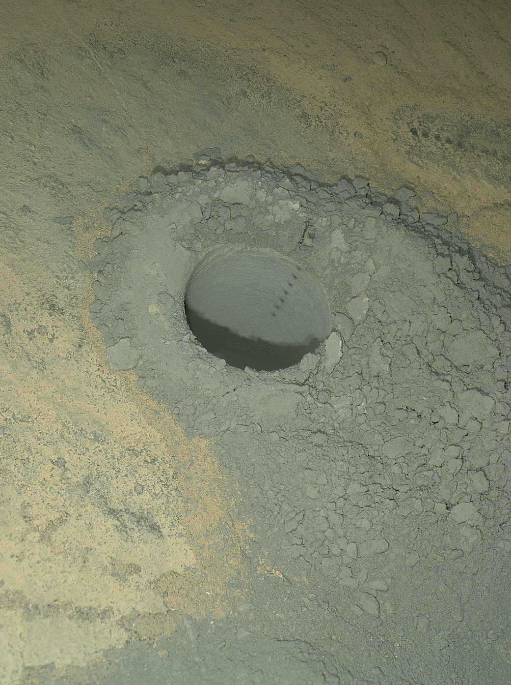 The Mars Hand Lens Imager on NASA's Curiosity Mars rover provided this nighttime view of a hole
