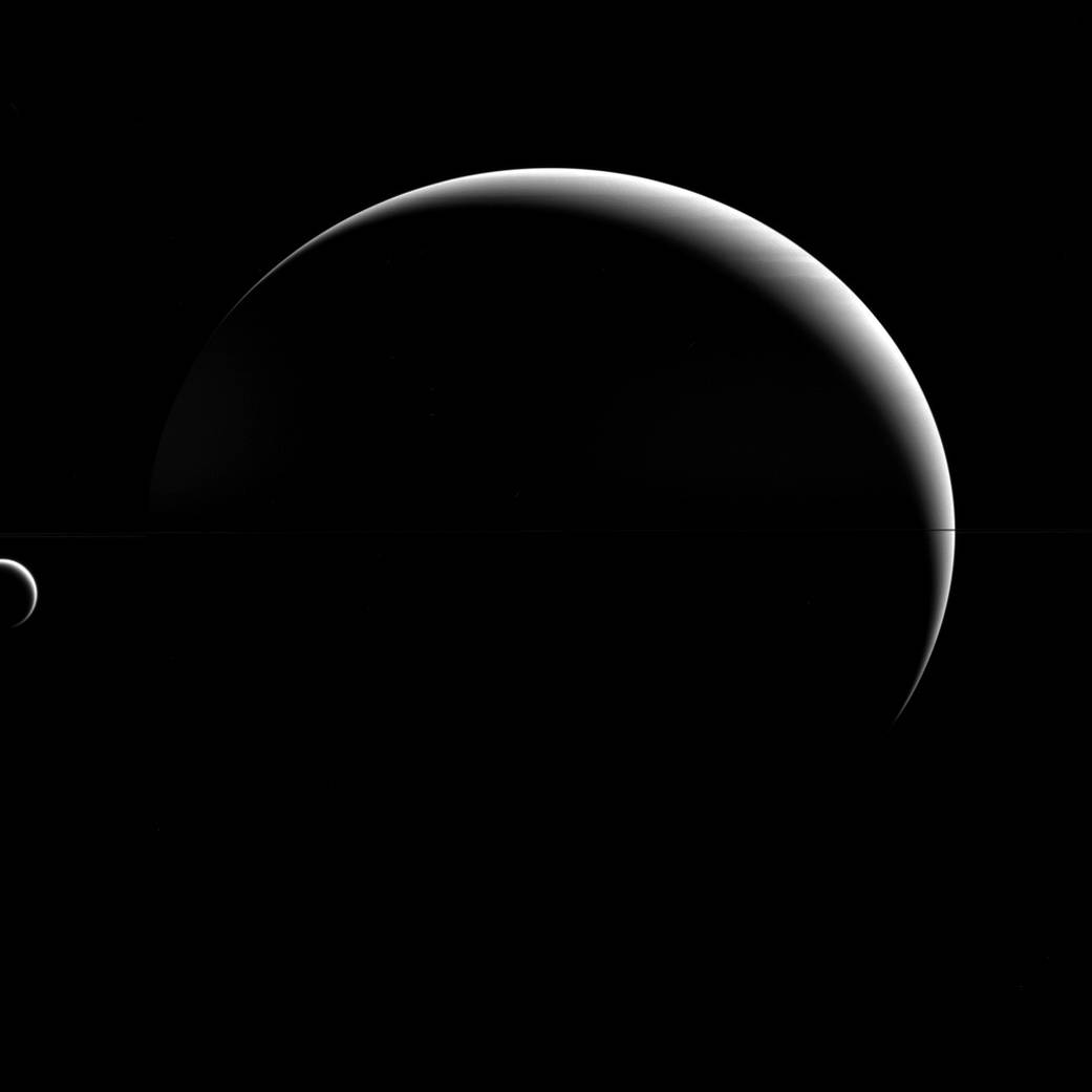 Titan may be a "large" moon - its name even implies it! - but it is still dwarfed by its parent planet, Saturn. 
