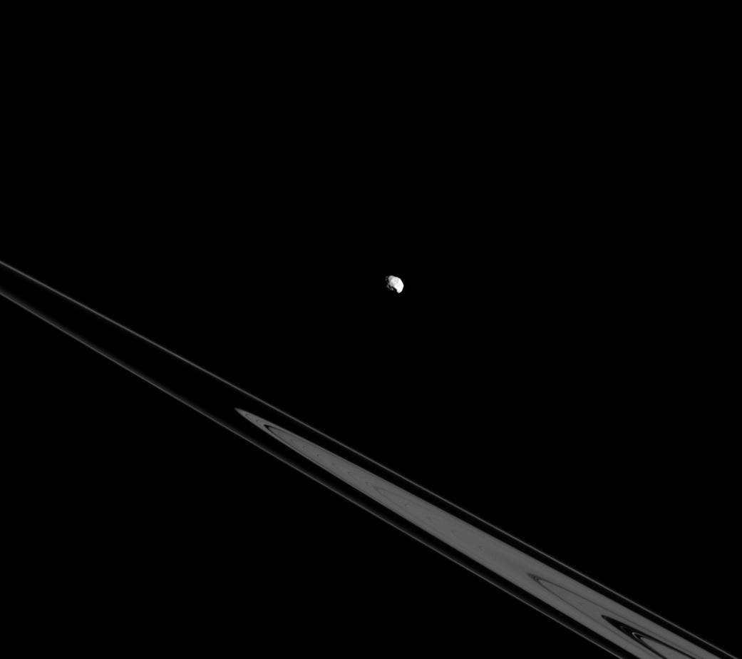 Epimetheus and the rings both orbit in Saturn's equatorial plane