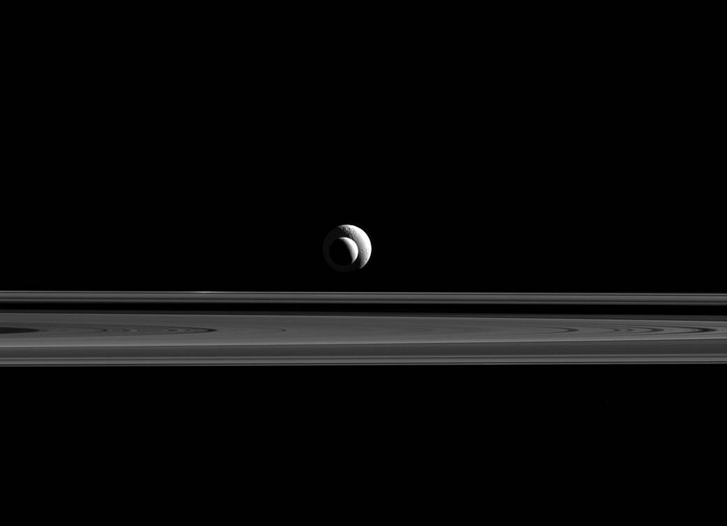 Enceladus and Tethys line up almost perfectly for Cassini's cameras