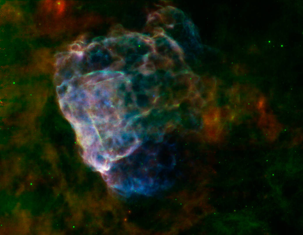 Supernova remnant appears as bubbly glowing cloud