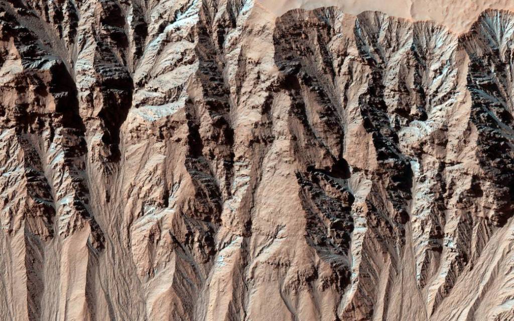 Changes Near Downhill End of a Martian Gully