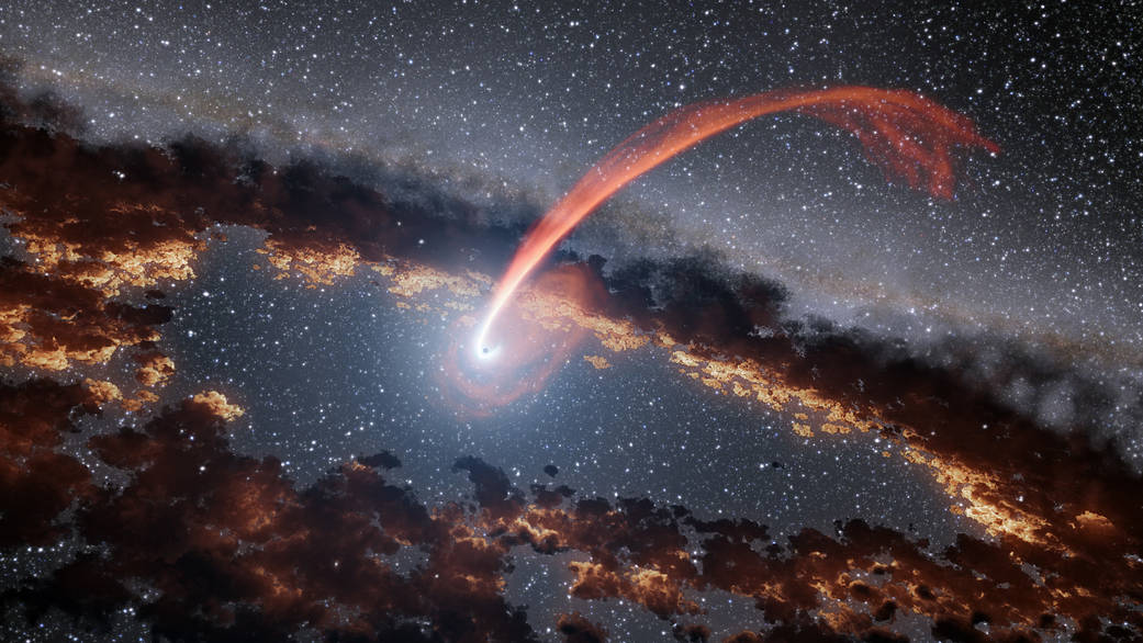 This illustration shows a glowing stream of material from a star as it is being devoured by a supermassive black hole 