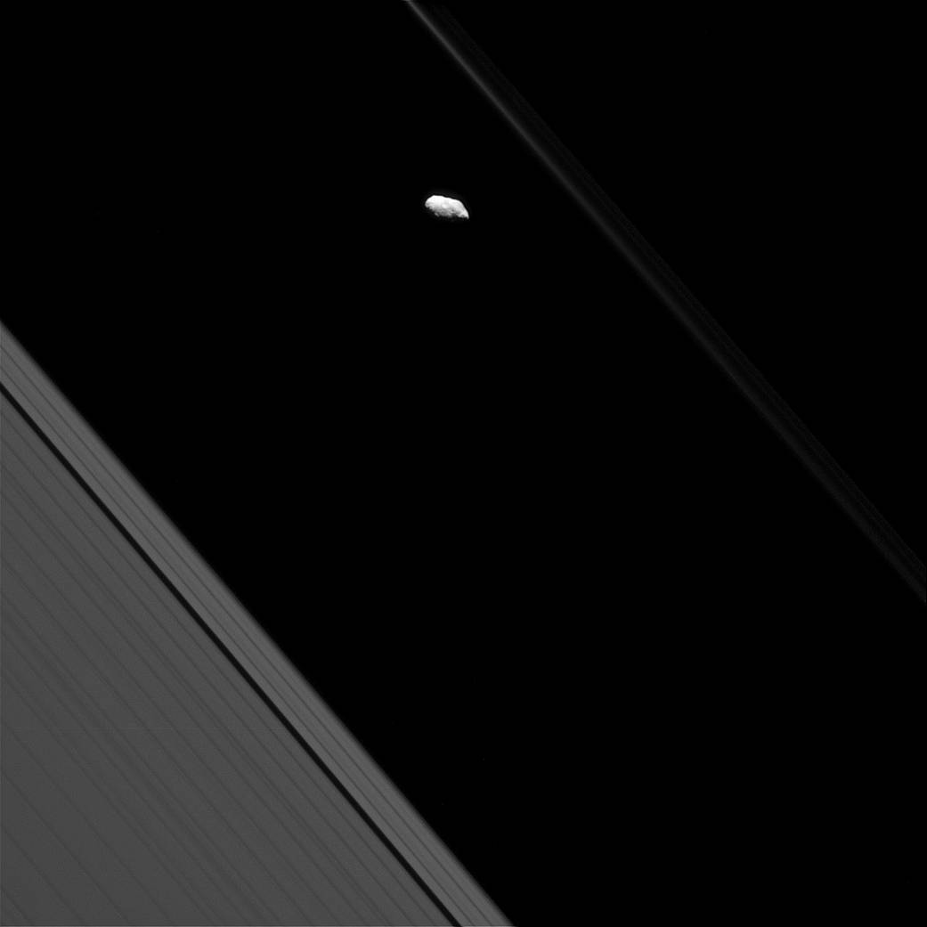 Surface features are visible on Saturn's moon Prometheus in this view from NASA's Cassini spacecraft