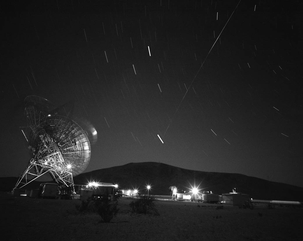 This photograph shows the first pass of Echo 1, America’s first communications satellite, over the Goldstone Tracking Station 