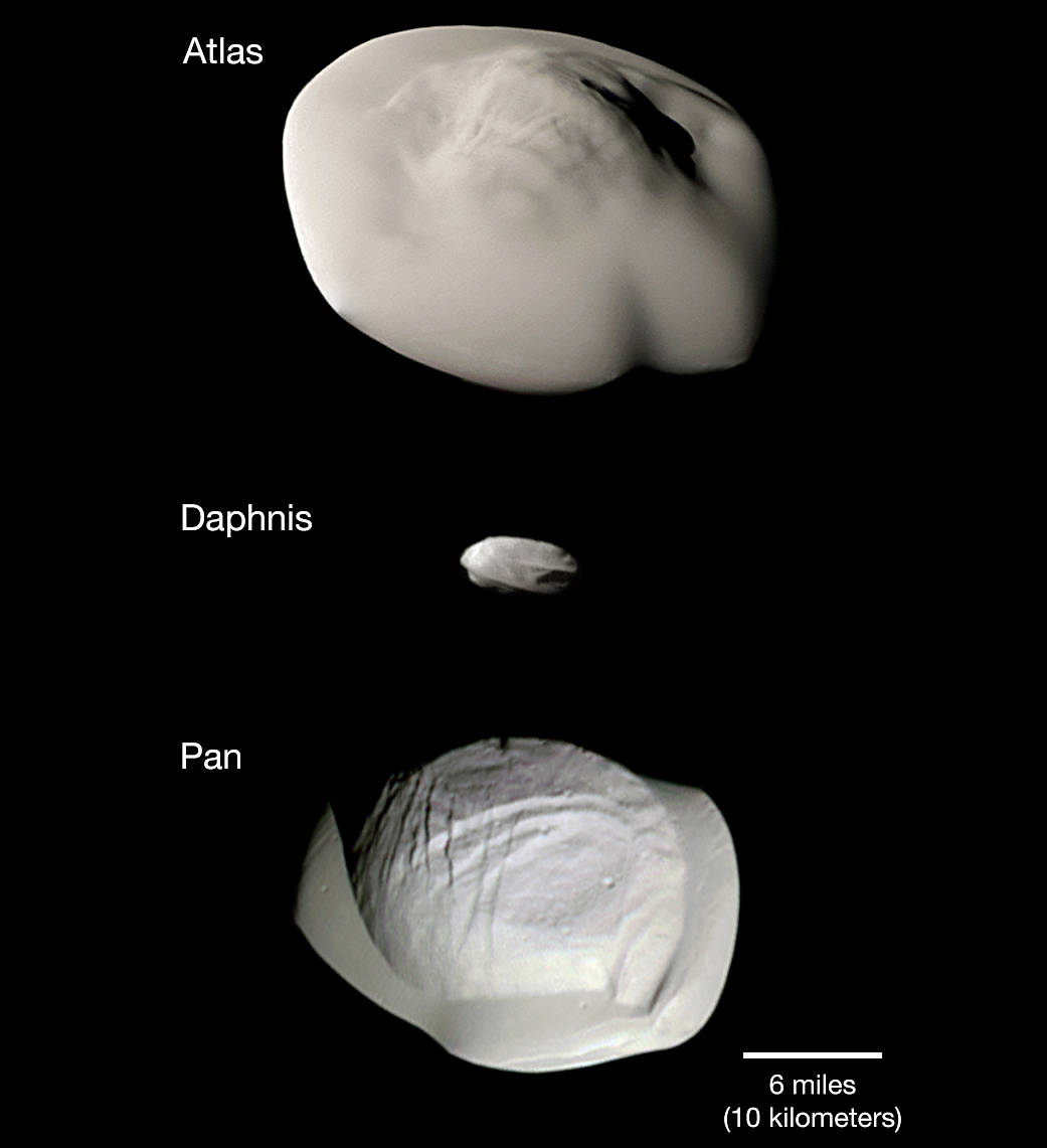 Montage of views from NASA's Cassini spacecraft shows three of Saturn's small ring moons: Atlas, Daphnis and Pan 