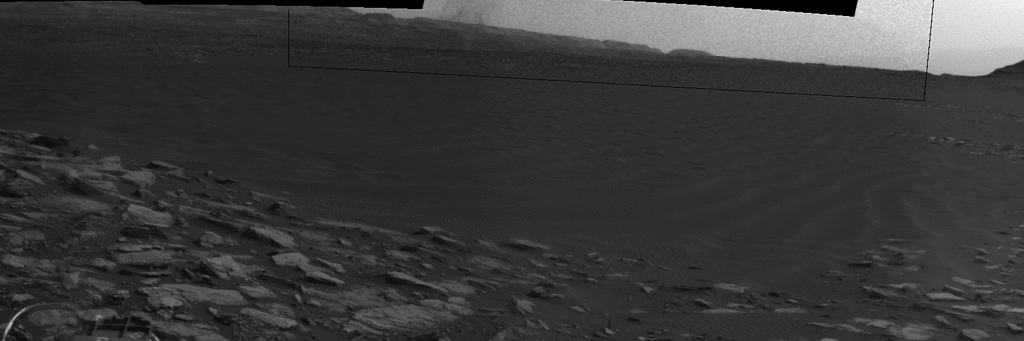 Dust Devil Passes Near Martian Sand Dune