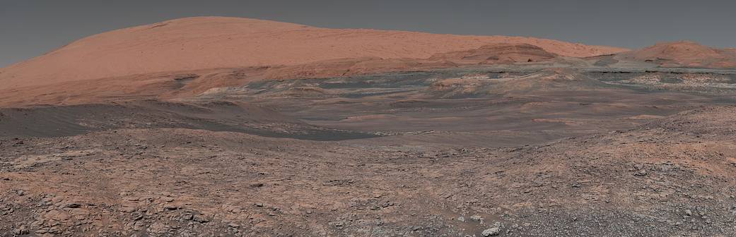 This mosaic taken by NASA's Mars Curiosity rover looks uphill at Mount Sharp
