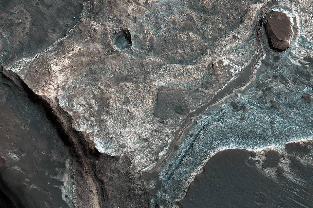 Layers along a Pit in Coprates Catena