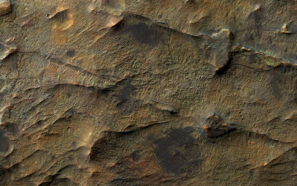 A set of straight ridges in ancient bedrock near Nirgal Valles