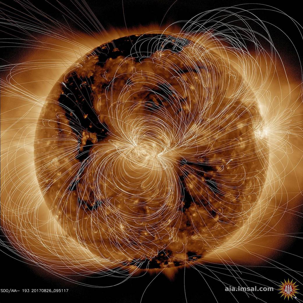 Image of Sun with magnetic field lines around the surface