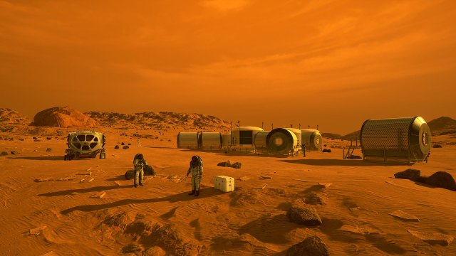 Artist concept depicting astronauts and human habitats on Mars