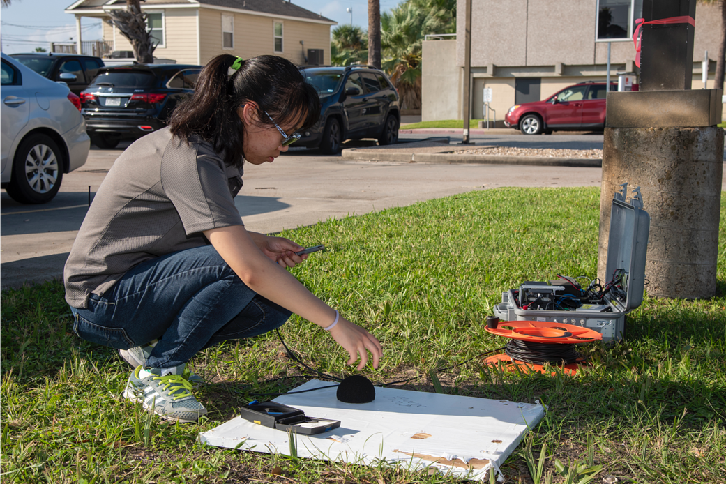 Young female preparing for a sound test.