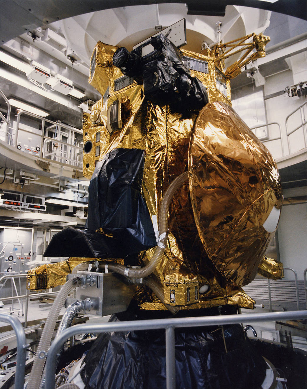 The Cassini spacecraft, with the Huygens probe visible on the right in this photo, sits atop a Titan IVB rocket