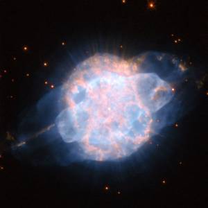 large blue and pink blob surrounds a bright star