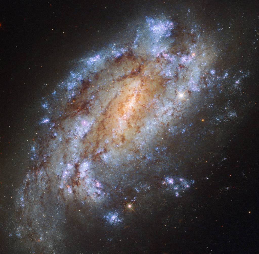 a bright, ragged spiral galaxy