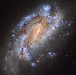 a bright, ragged spiral galaxy