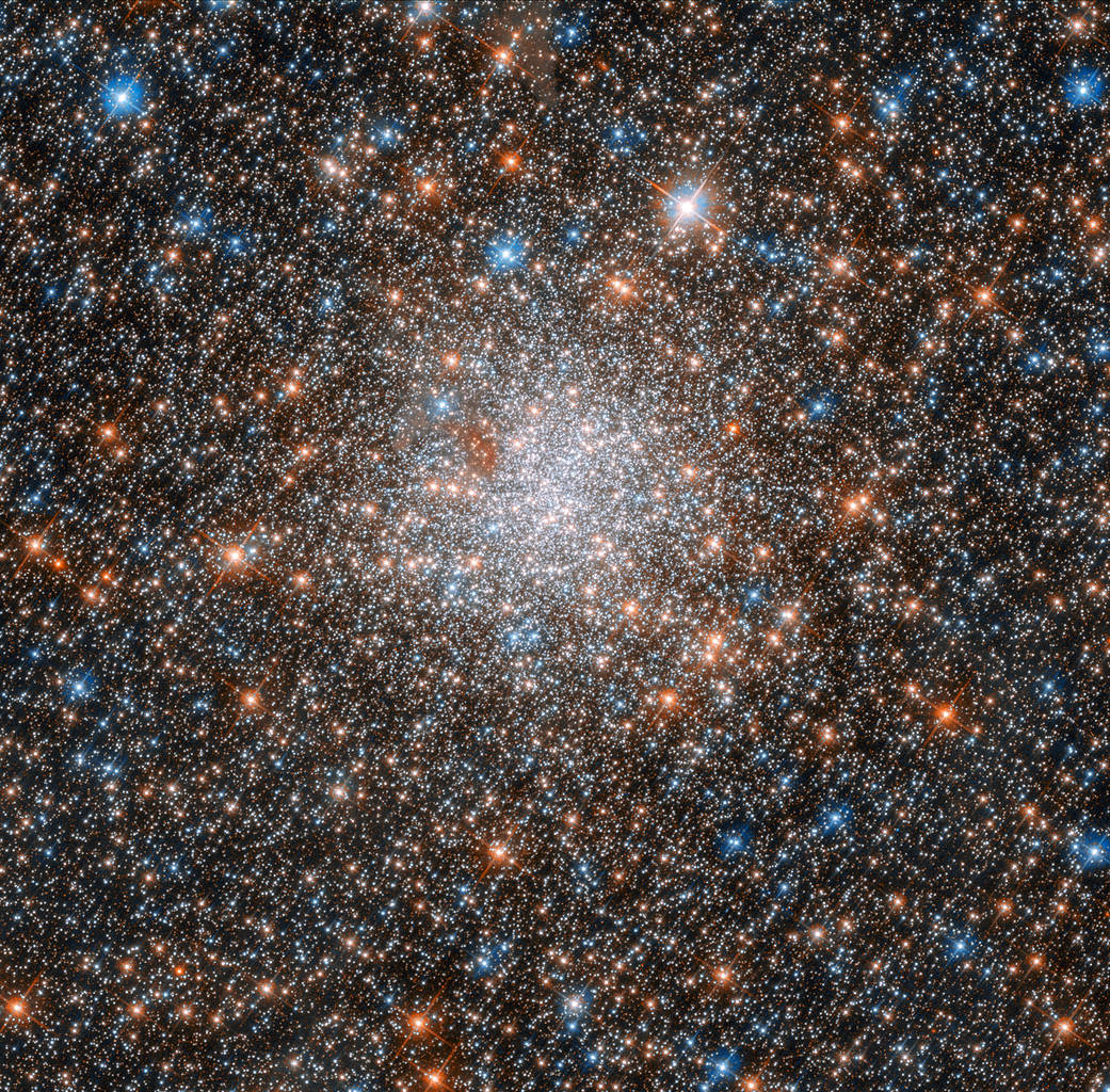 bright cluster of stars in a crowded field