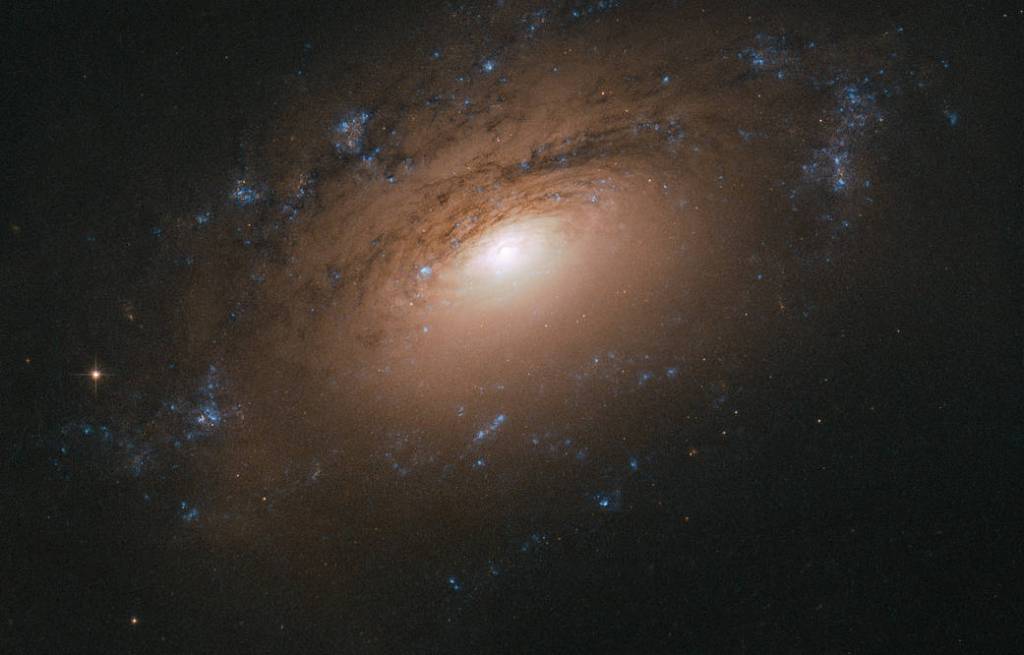NGC 3169 spiral galaxy, as seen by Hubble