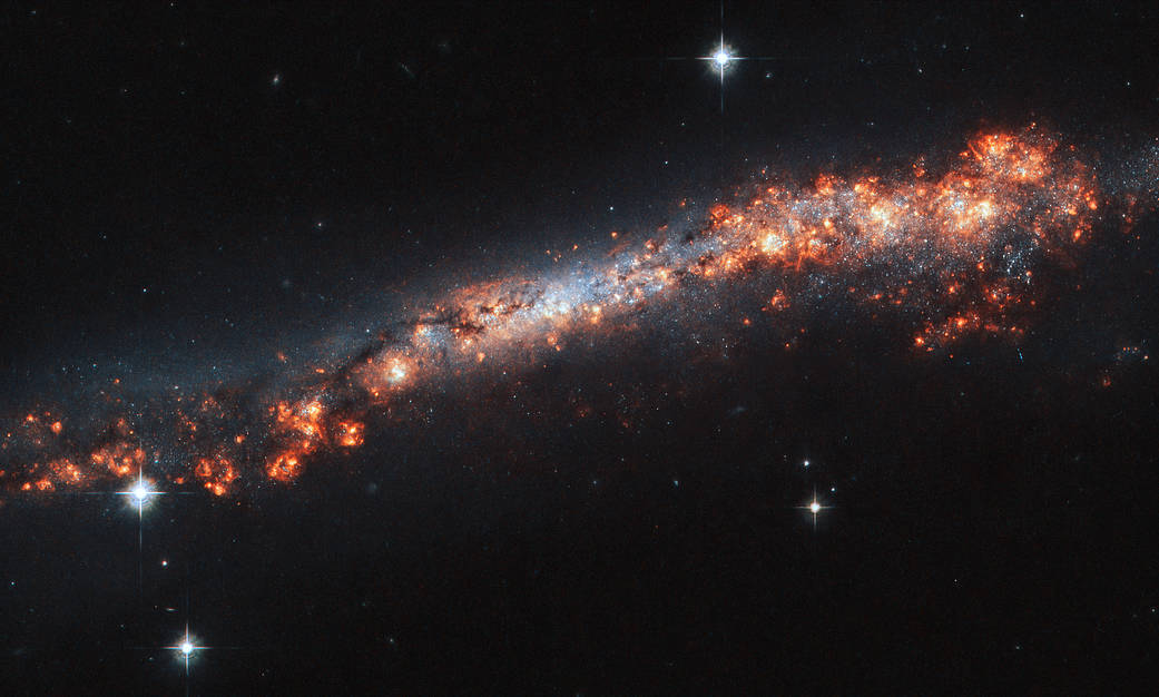 NGC 3432 spiral galaxy, as seen by Hubble