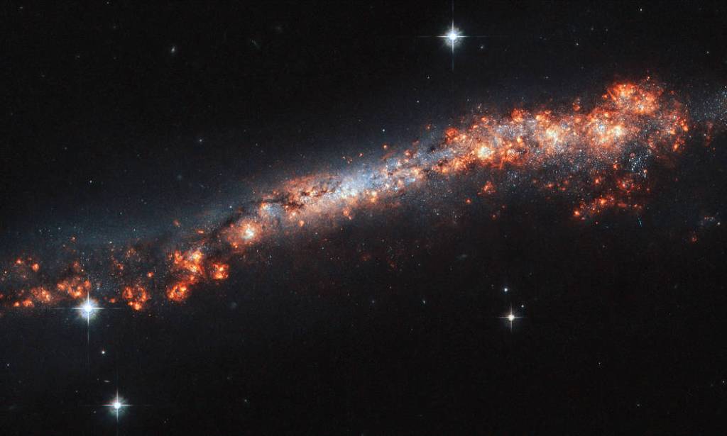 NGC 3432 spiral galaxy, as seen by Hubble