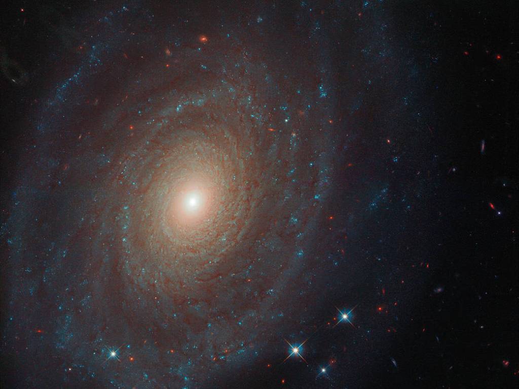 bright spiral galaxy NGC 691 as seen by Hubble