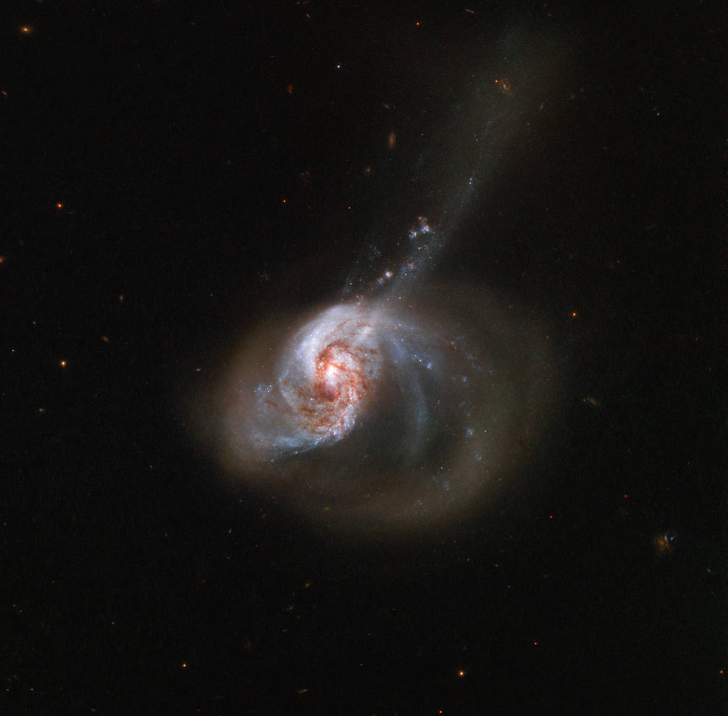 swirling galaxy against black backdrop of space
