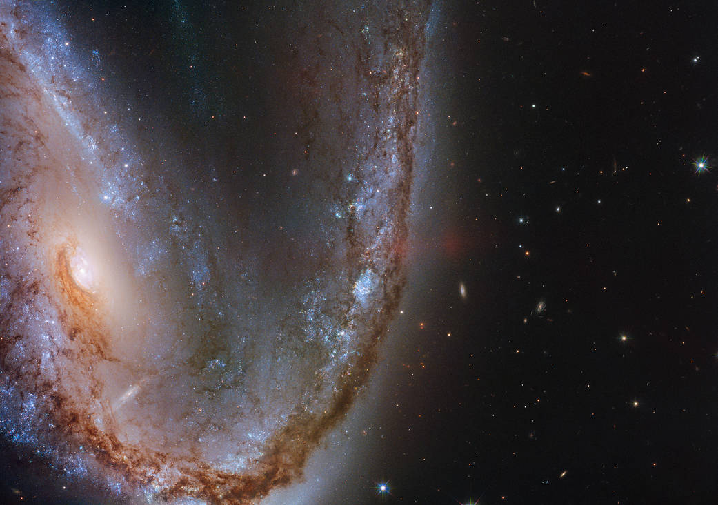 purplish-blue "Meathook galaxy" against black backdrop of space