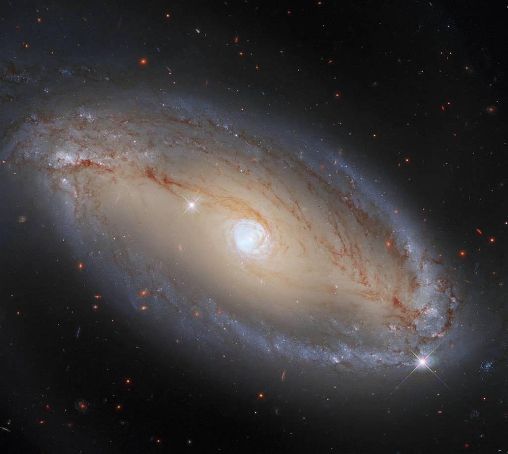 In this image, NCG 5728 appears to be an elegant, luminous, barred spiral galaxy. 