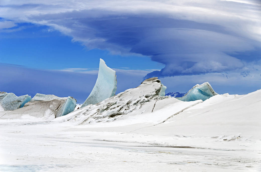 An Operation IceBridge project scientist took this Nov. 24, 2013 photograph of a multi-layered lenticular cloud hovering near Mo