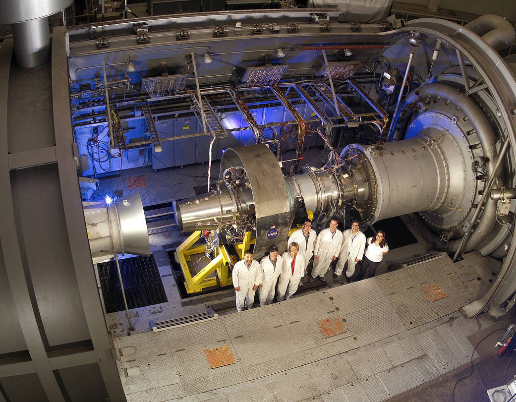 Technicians set up a jet engine for testing in the Propulsion Systems Laboratory at NASA Glenn.