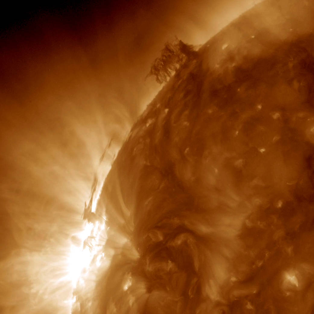 Dark strands of plasma hovering above the Sun's surface began to interact with each other in a form of tug of war.