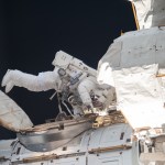 NASA astronaut Mike Hopkins is pictured outside the Quest airlock where spacewalks are staged in Extravehicular Mobility Units (EMUs), or spacesuits.